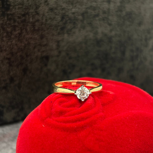 Gouden solitaire ring, dames