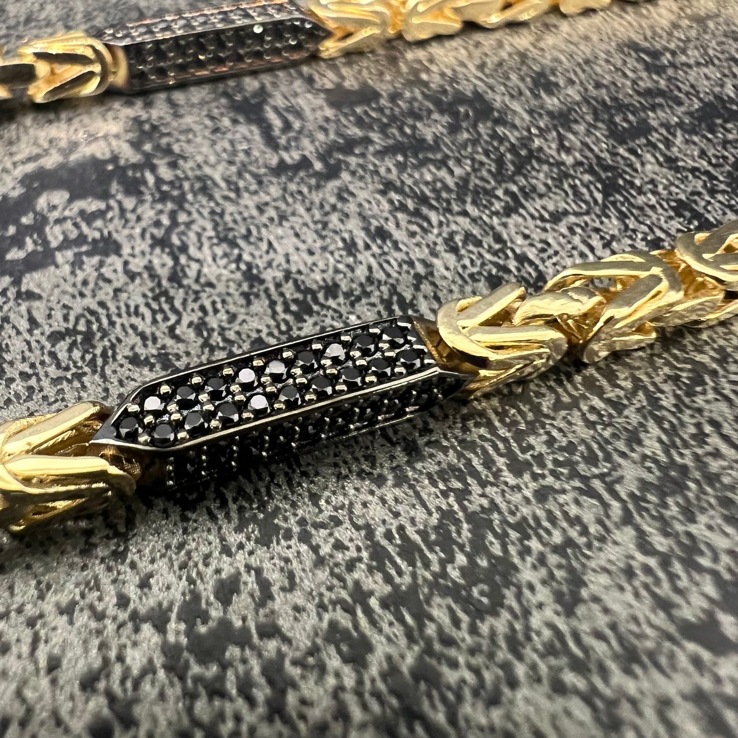 14 karaat gouden koningsketting met zwarte onyx stenen