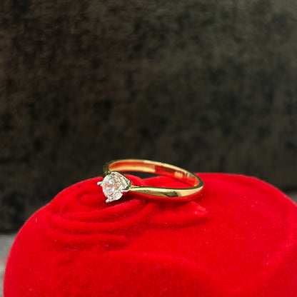 Gouden solitaire ring dames