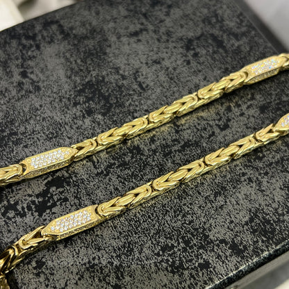 14 karaat gouden koningsketting bezet met schitterende stenen