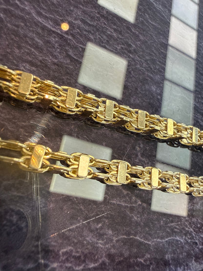 Prachtige 14 karaats gouden Magnum ketting met uniek kruis