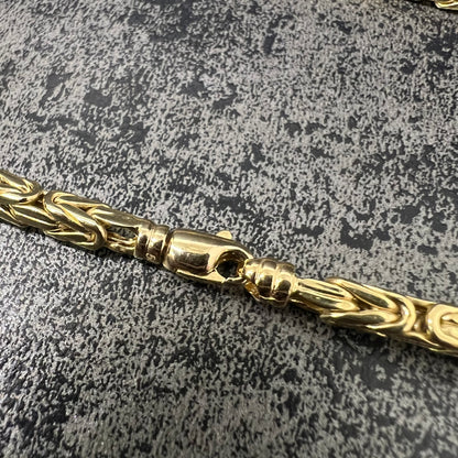 14 karaat gouden koningsketting bezet met schitterende stenen