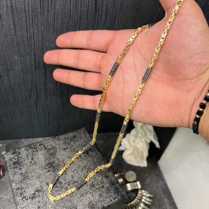 14 karaat gouden koningsketting met zwarte onyx stenen