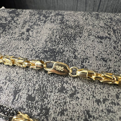 14 karaat gouden koningsketting met zwarte onyx stenen